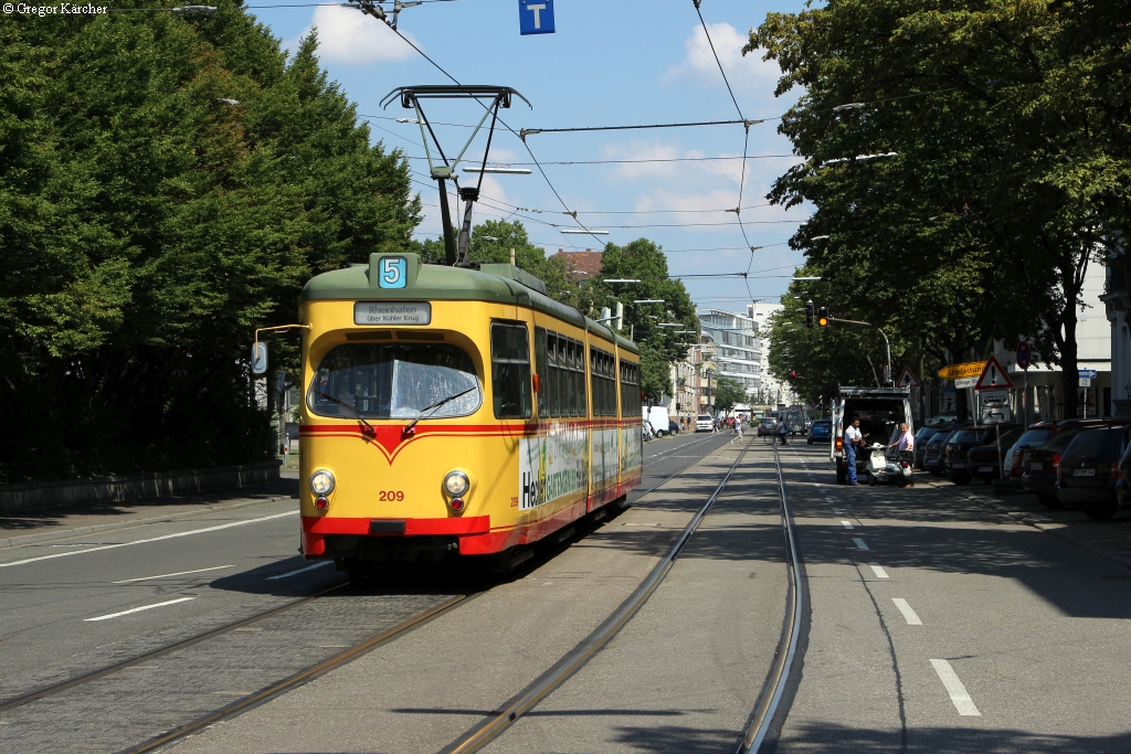 TW 209 in der Baumeisterstr. bei der Haltestelle Volkswohnung, 25.07.2014.