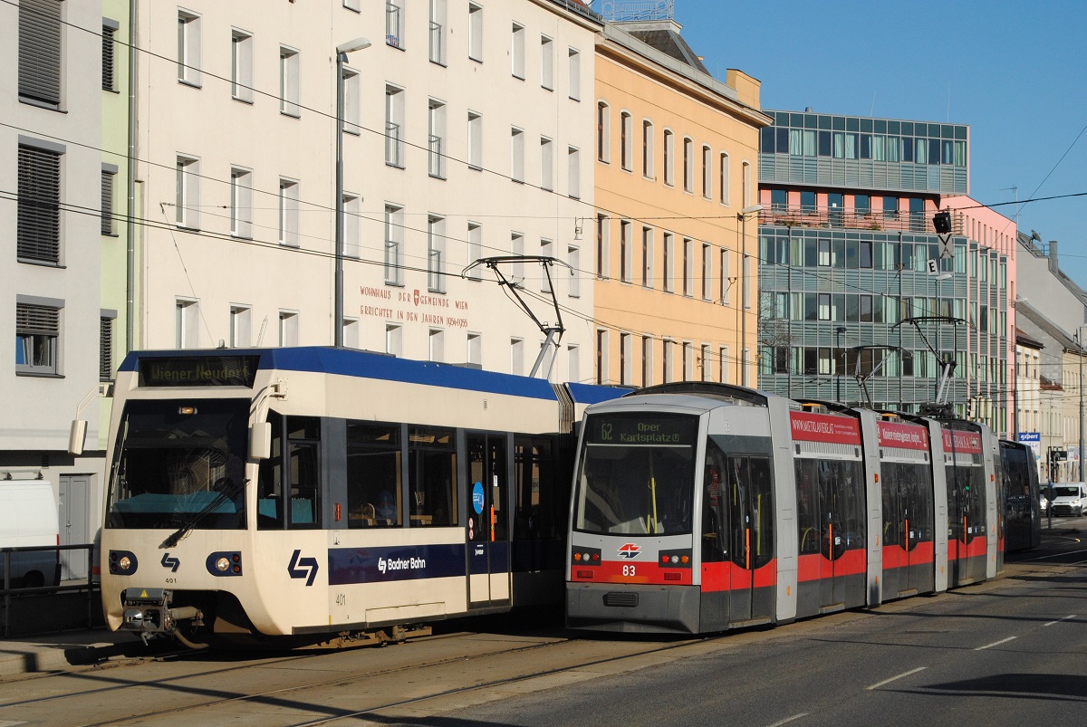 Tw.401 als Verstärkerzug nach Wiener Neudorf begegnet in der Eichenstraße dem stadteinwärts fahrenden Tw.83 der Linie 62. (07.01.2022)