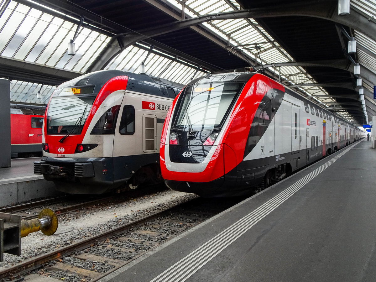 Twindexx RABDe 502 als IC3 neben RABe 511 025 als RE nach Chur in Zürich HB, 04.12.2019.