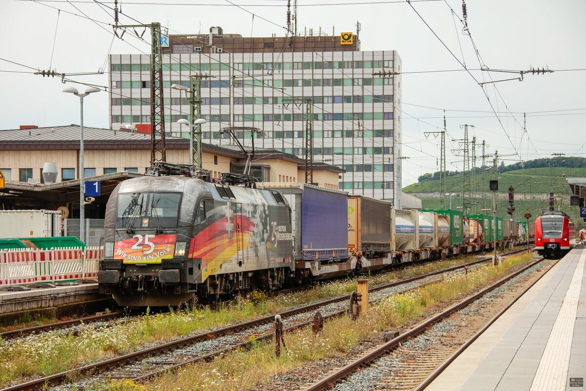 TXL 182 560  Mauerfall  Taurus in Würzburg Hbf, August 2021.