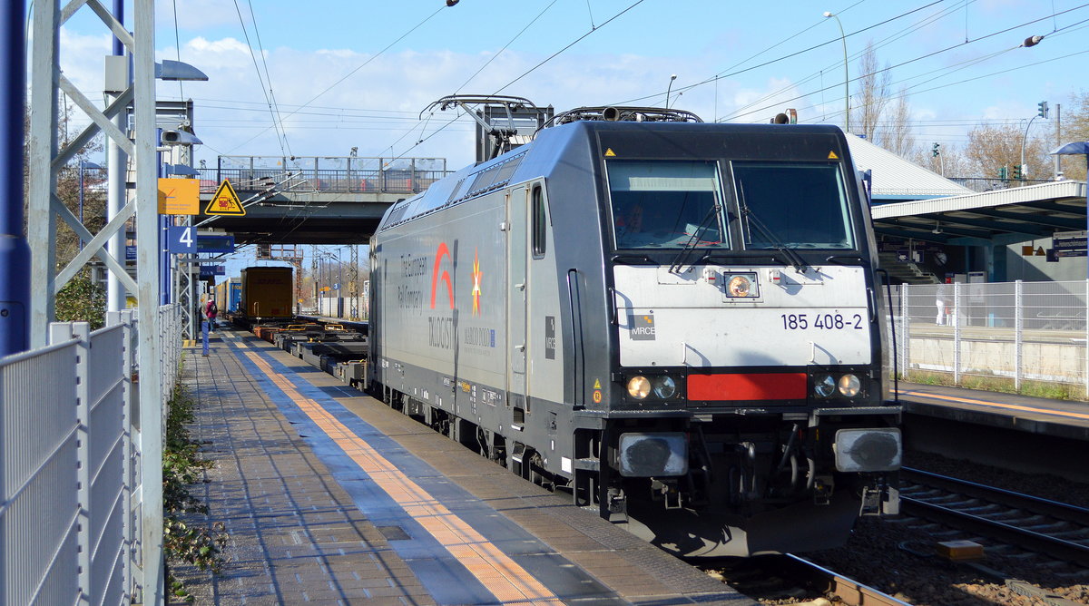 TXL - TX Logistik AG mit der MRCE Dispo  185 408-2  [NVR-Number: 91 80 6185 408-2 D-DISPO] und KLV-Zug ab Rostock am 18.03.19 Durchfahrt Bf. Berlin-Hohenschönhausen.