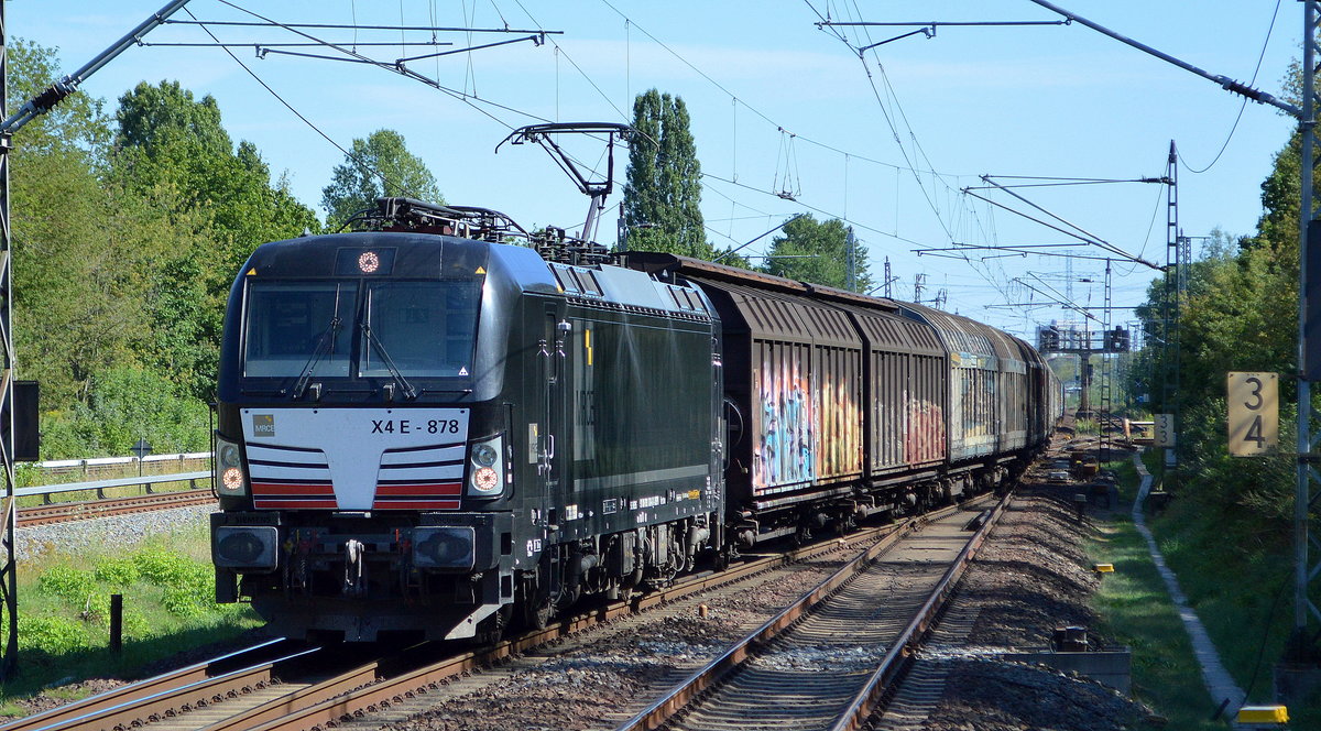 TXL - TX Logistik AG, Troisdorf [D] mit der MRCE Vectron   X4 E - 878  [NVR-Nummer: 91 80 6193 878-6 D-DISPO] und Ganzzug Schiebewandwagen am 06.08.20 Bf. Berlin Hohenschönhausen Richtung Rostock.