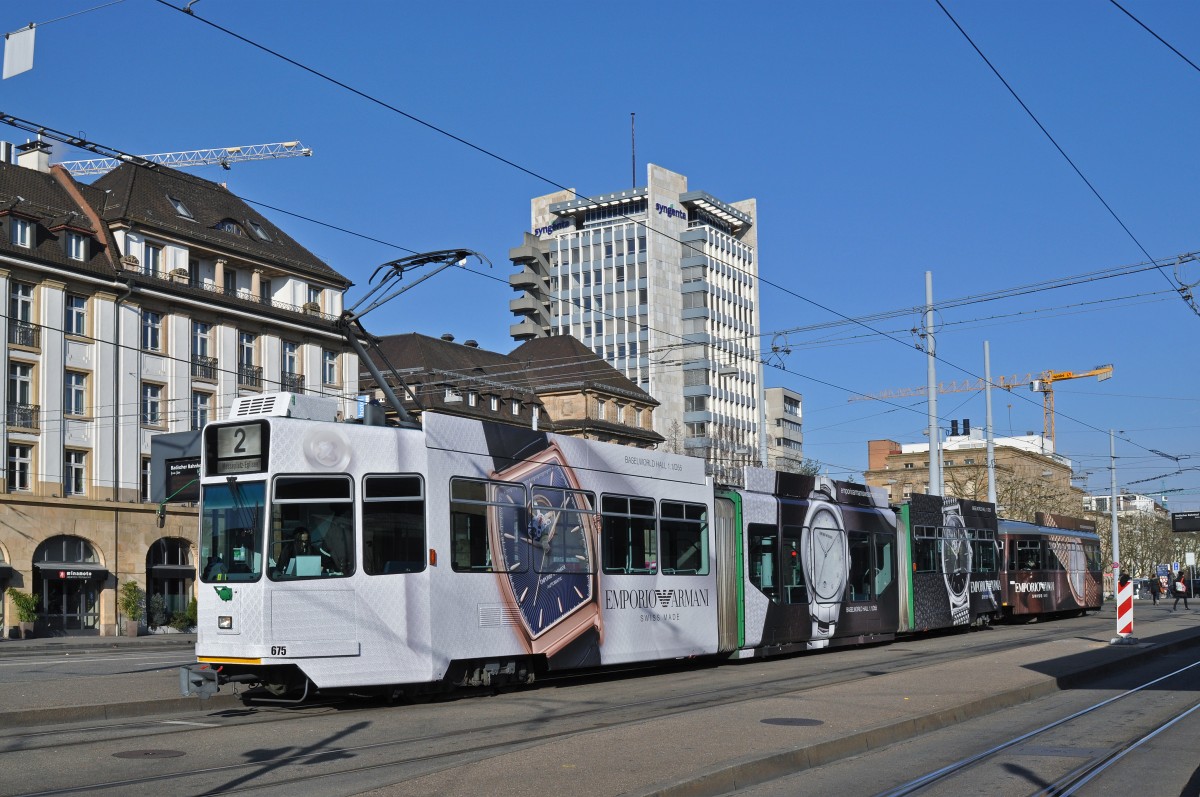 Vollwerbezug, mit dem Be 4/6 S 675 und dem B 1459, macht Werbung für Emporio Armani, anlässlich der Basel World 2016. Der Zug bedient hier die Haltestelle Badischer Bahnhof Richtung Eglisee. Die Aufnahme stammt vom 07.02.2016.