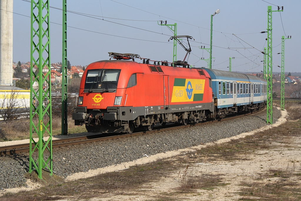Von den BB gemietete GySEV 1116 059-7 vor dem D 992 von Gyr nach Sopron am 08.Mrz 2014 kurz vor dem Bf. Sopron. 

