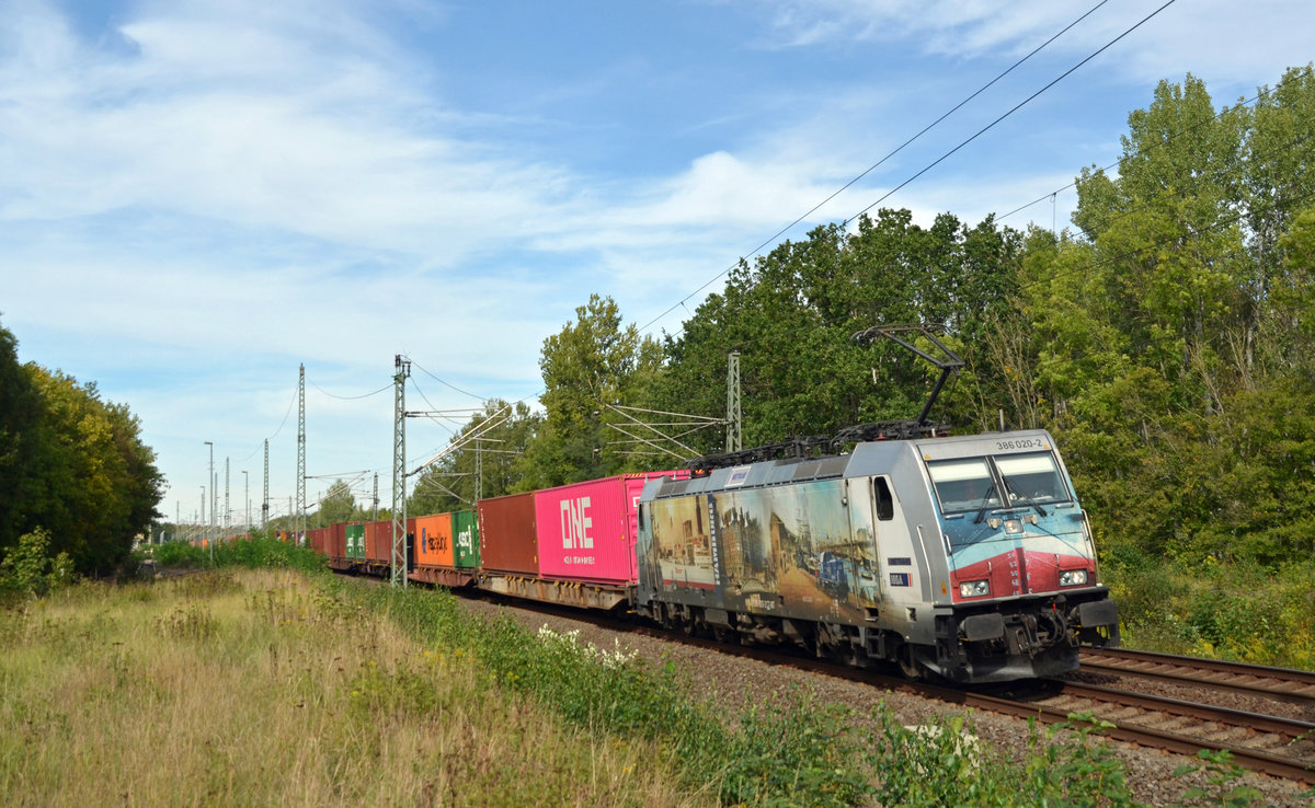 Wegen der Sperrung der Strecke Berlin - Dresden wurde 386 020 mit ihrem Metrans-Containerzug über Muldenstein Richtung Leipzig umgeleitet. Fotografiert am 15.09.19.