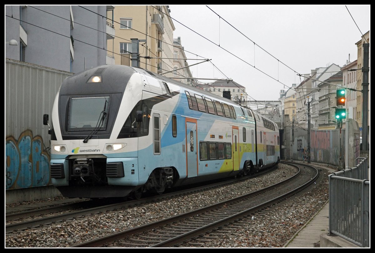 Westbahn Triebwagen 112 nahe Wien Rennweg am 13.12.2018.