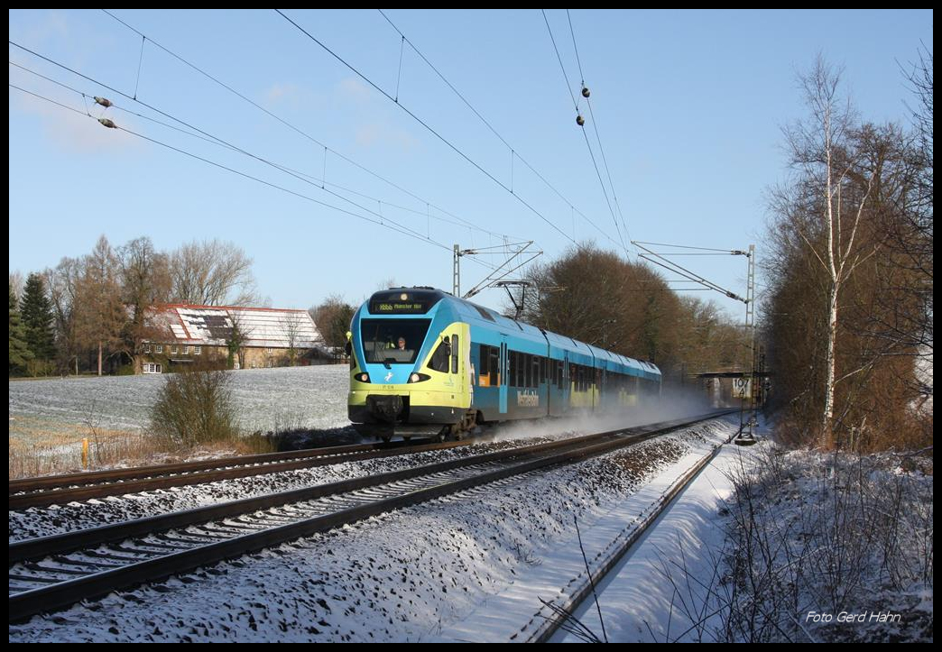 Westfalenbahn ET 018 ist hier bei Hasbergen am 15.1.2017 um 12.25 Uhr auf der RB 66 nach Münster unterwegs.