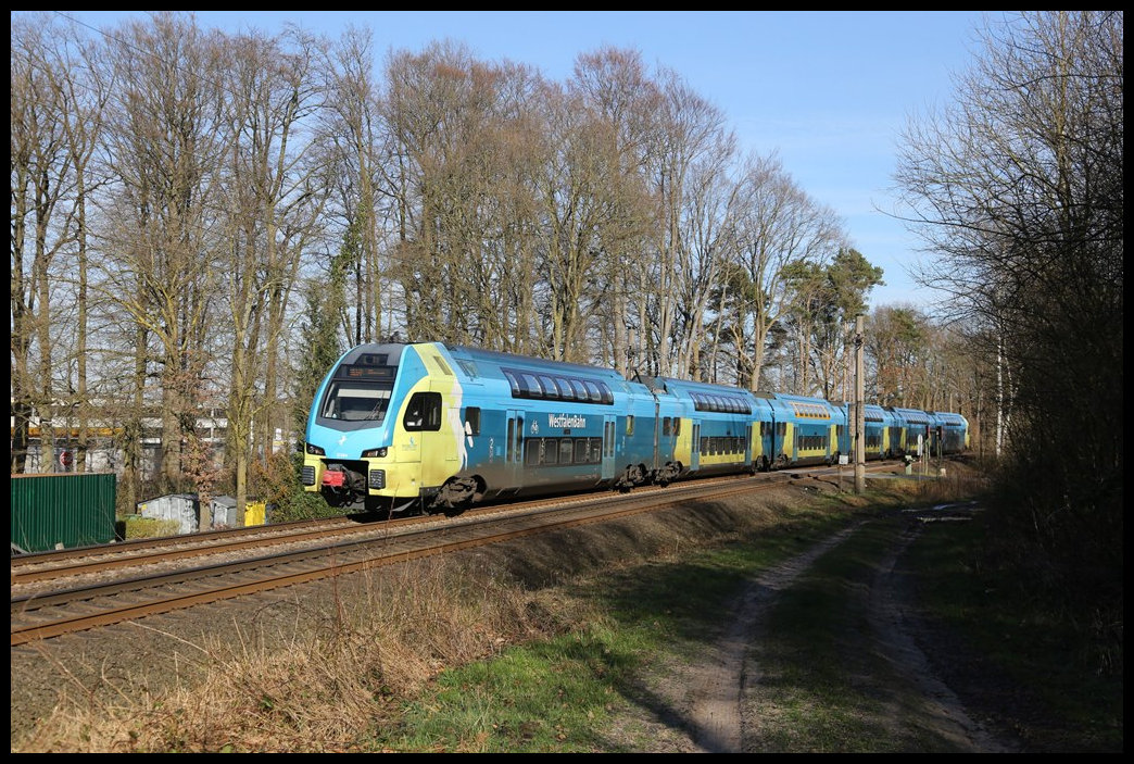 WFB ET 604 ist hier am 23.02.2022 umn 14.56 Uhr auf der Fahrt von Braunschweig nach Rheine im Wald bei Atter unterwegs. 