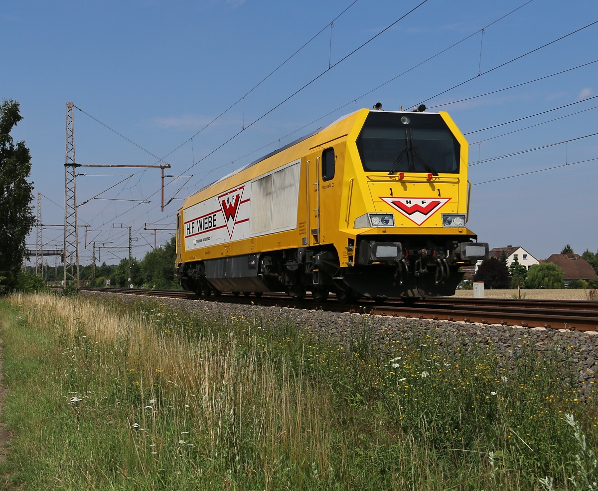 Wiebe 264 011-8 als Tfzf in Fahrtrichtung Seelze. Aufgenommen in Dedensen-Gümmer am 24.07.2015.