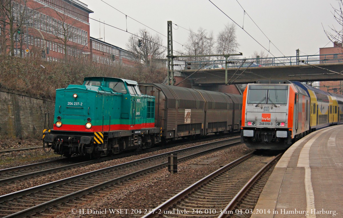WSET 204 237-2 und rechts hvle 246 010-3 mit RE5 nach Cuxhaven in Hamburg Harburg, M�rz 2014.
