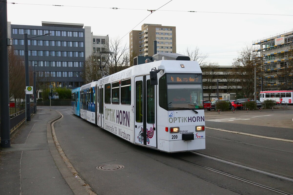 WVV Straßenbahn Würzburg LHB GT-E Wagen 209 am 27.12.23 in Würzburg 
