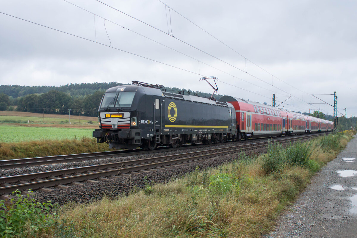 X4 E-861 fährt als RE in Richtung Frankfurt/M.,gesehen am 12.09.2024 bei Kerzell.