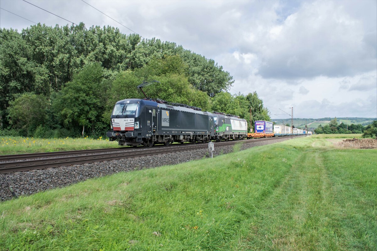 X4E -650 + 193 745-7 mit einen Aufliegerzug / Himmelstadt / 17.08.2021