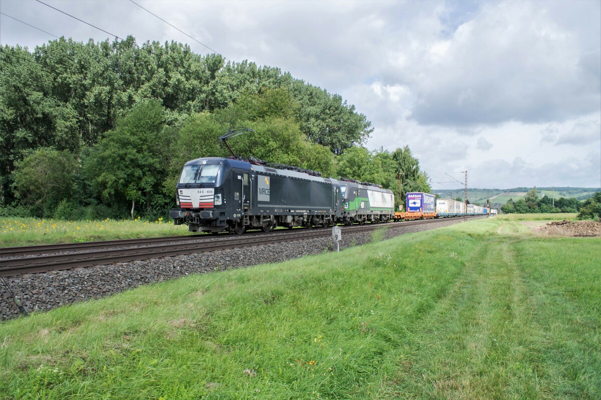 X4E -650 + 193 745-7 mit einen Aufliegerzug / Himmelstadt / 17.08.2021