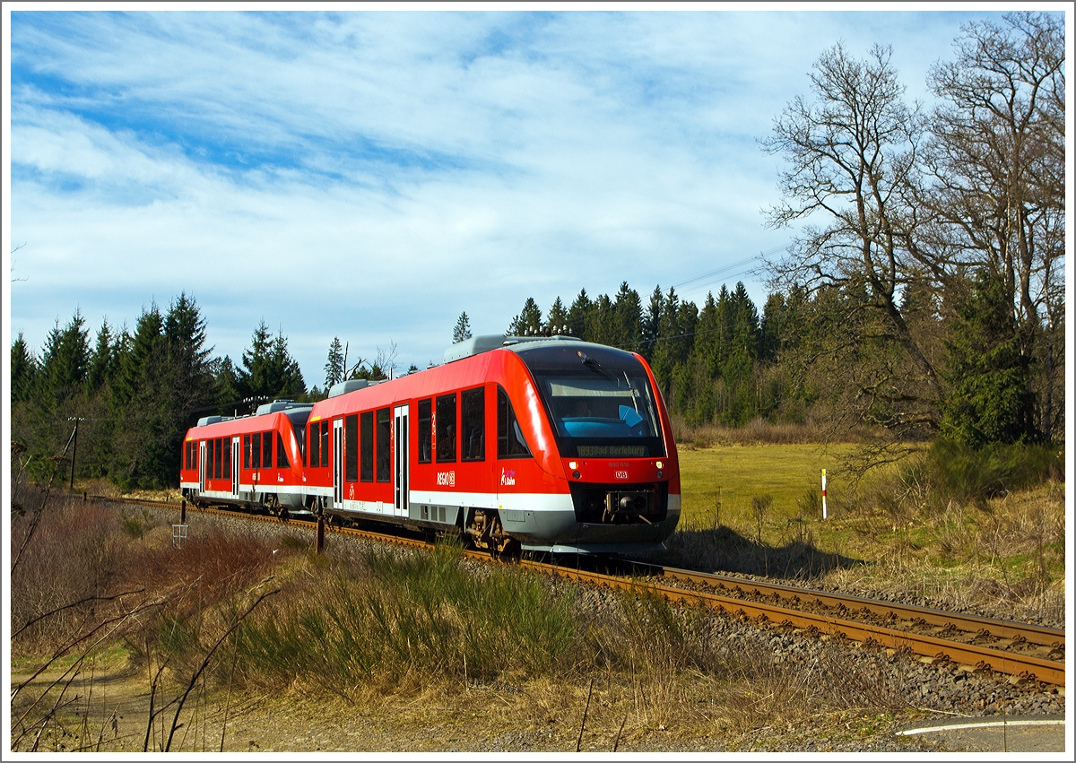 Zwei Alstom Coradia LINT 27 in Doppeltraktion (640 016 und 640 011 fahren am 20.03.2014 als RB 93 (Rothaarbahn) Siegen - Kreuztal - Erndtebrück - Bad Berleburg auf der KBS 443  Rothaarbahn  in Richtung Bad Berleburg, hier zwischen Altenteich und Erndtebrück.