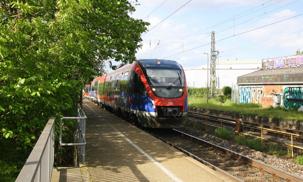 Zwei Euregiobahn (RB20) aus Heerlen(NL)-Düren-Stolberg-Altstadt kommt die Kohlscheider-Rampoe hoch aus Richtung Herzogenrath und hält in Kohlscheid und fährt in Richtung Richterich,Laurensberg,Aachen-West bei Sonne und Wolken am 7.5.2014.