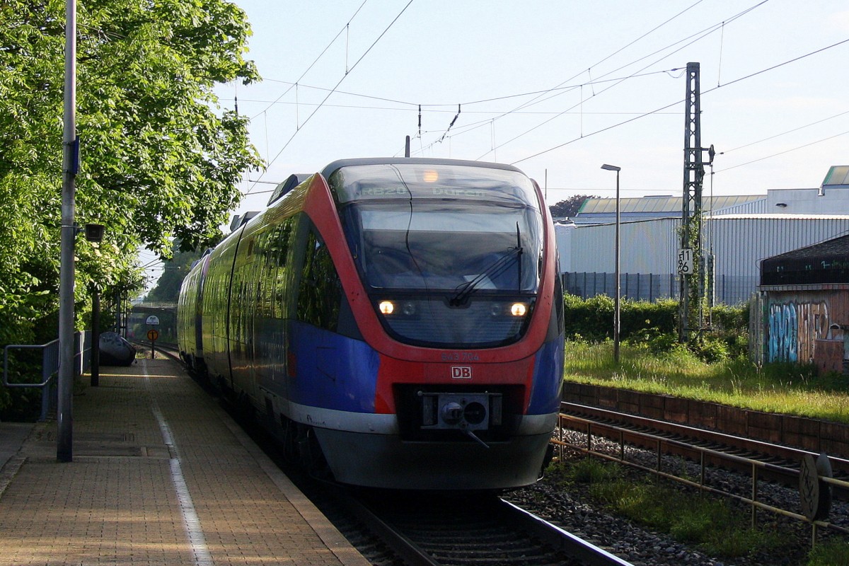 Zwei Euregiobahn (RB20) aus Heerlen(NL)-Stolberg-Altstadt-Düren kommt die Kohlscheider-Rampe hoch aus Richtung Herzogenrath und hält in Kohlscheid und fährt in Richtung Richterich,Laurensberg,Aachen-West bei Sonne und Wolken am Morgen des 15.5.2014.