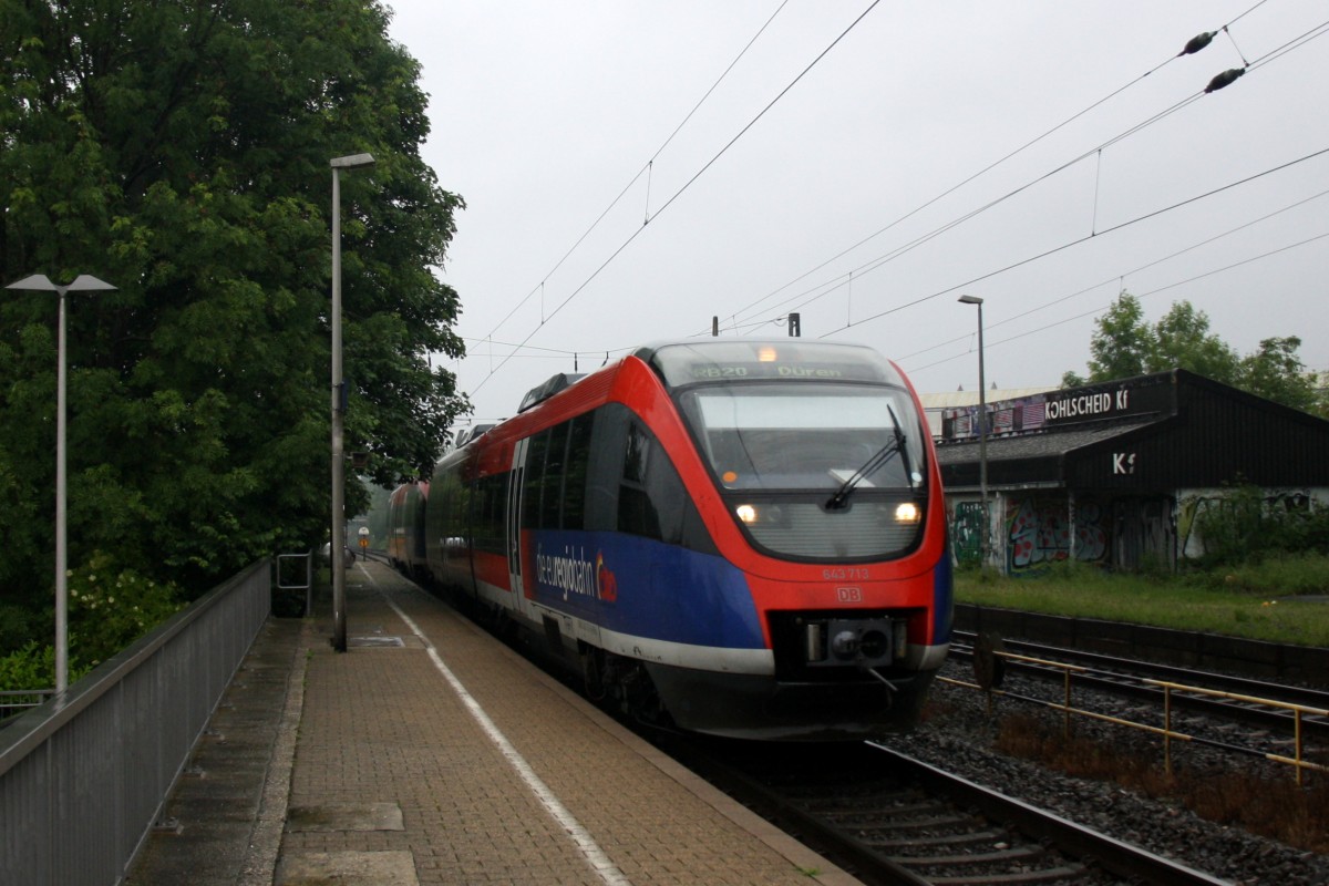 Zwei Euregiobahn (RB20) aus Heerlen(NL)-Stolberg-Altstadt-Düren kommt die Kohlscheider-Rampe hoch aus Richtung Herzogenrath und hält in Kohlscheid und fährt in Richtung Richterich,Laurensberg,Aachen-West.
Bei Regenwetter am Morgen vom 27.5.2014.
