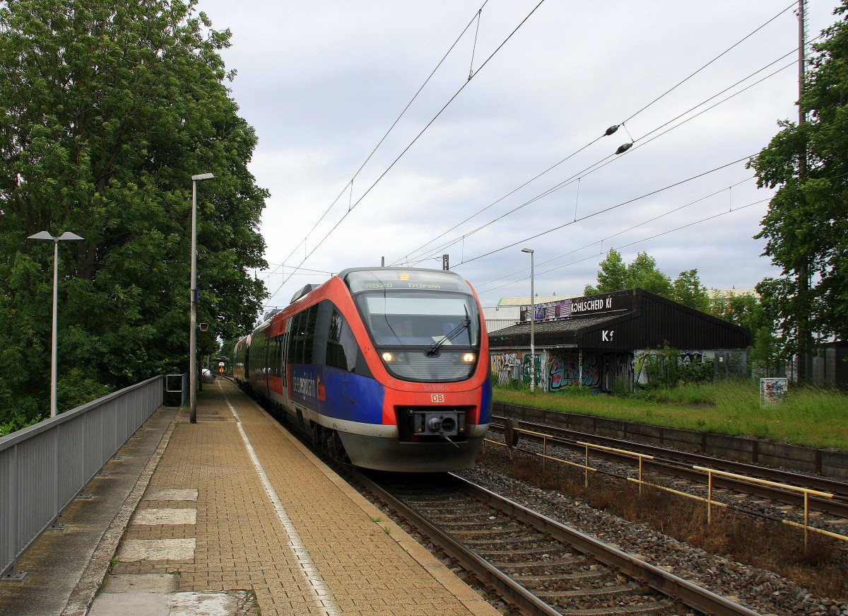 Zwei Euregiobahn (RB20) aus Heerlen(NL)-Stolberg-Altstadt-Düren kommt die Kohlscheider-Rampoe hoch aus Richtung Herzogenrath und hält in Kohlscheid und fährt in Richtung Richterich,Laurensberg,Aachen-West. Bei Sonne und Wolken am Morgen vom 5.6.2014.