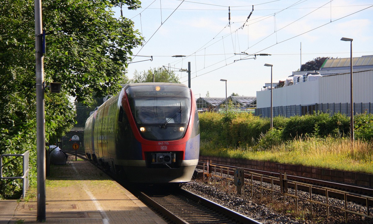 Zwei Euregiobahn (RB20) aus Heerlen(NL)-Stolberg-Altstadt-Düren kommt die Kohlscheider-Rampe hoch aus Richtung Herzogenrath und hält in Kohlscheid und fährt in Richtung Richterich,Laurensberg,Aachen-West bei schönem Sonnenschein am Morgen vom 23.6.2014.