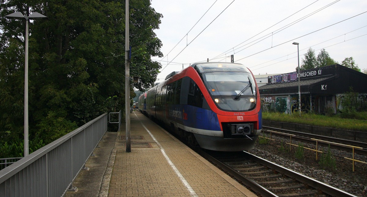 Zwei Euregiobahn (RB20) aus Heerlen(NL)-Stolberg-Altstadt-Düren kommt die Kohlscheider-Rampe hoch aus Richtung Herzogenrath und hält in Kohlscheid und fährt in Richtung Richterich,Laurensberg,Aachen-West.
Bei Wolken am Morgen vom 4.9.2014.
