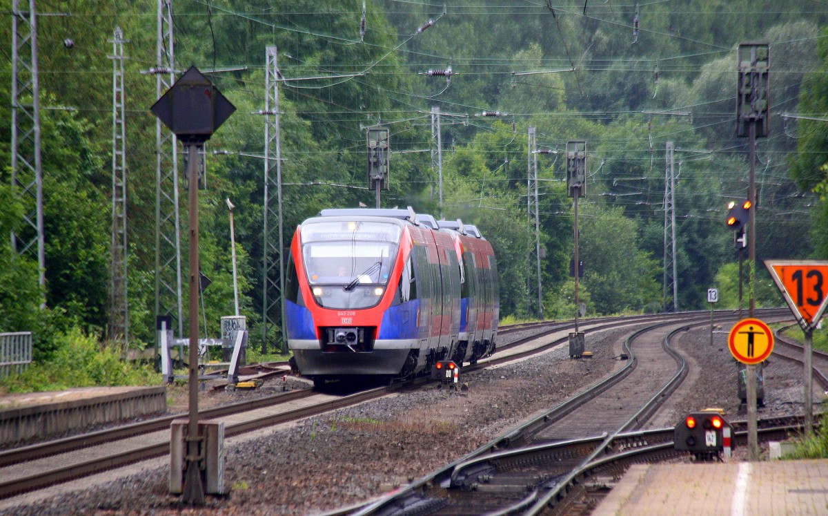 Zwei Euregiobahn (RB20) kommt aus Richtung Aachen-West,Laurensberg,Richterich und fährt durch Kohlscheid und fährt in Richtung Herzogenrath bei Wolken am Morgen vom 20.6.2014.