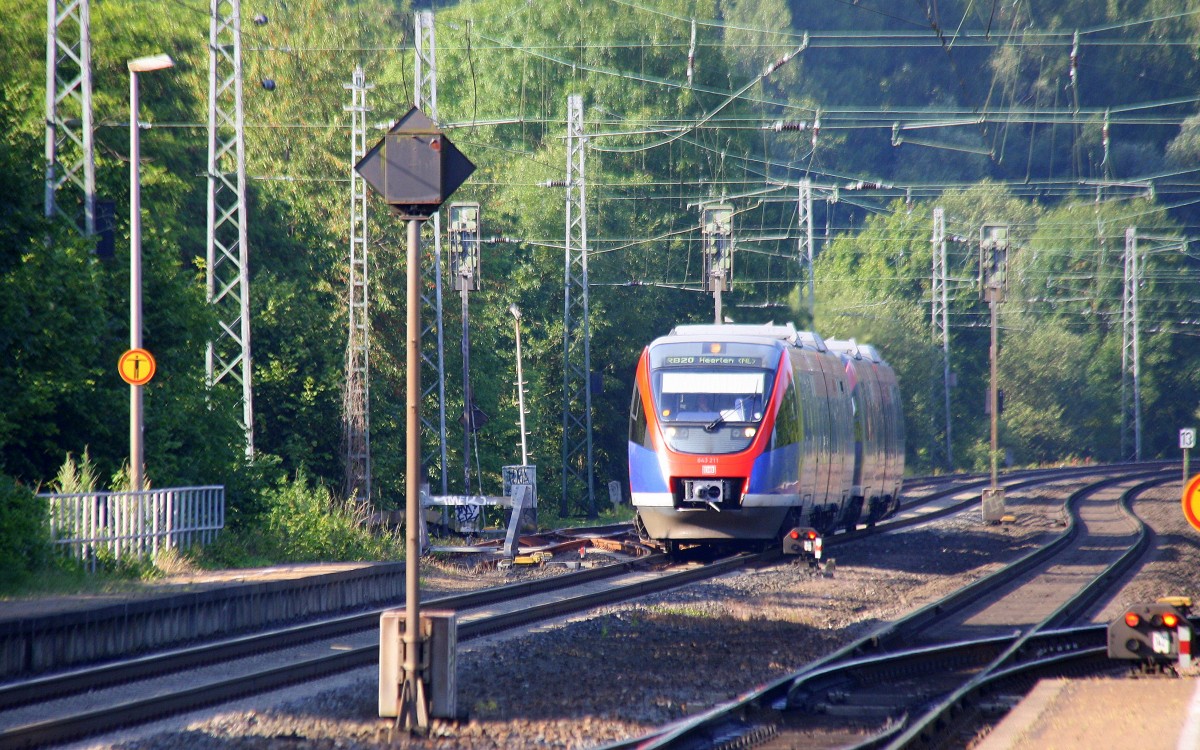 Zwei Euregiobahn (RB20) kommt aus Langerwehe-Stolberg-Altstadt nach Heerlen(NL) aus Richtung Aachen-West,Laurensberg,Richterich und hält in Kohlscheid und fährt in Richtung Herzogenrath.
Bei schönem Sonnenschein am Morgen vom 24.6.2014.