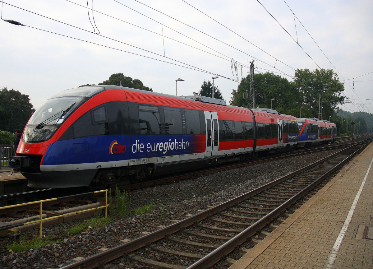Zwei Euregiobahn (RB20) kommt aus Langerwehe-Stolberg-Altstadt nach Heerlen(NL) aus Richtung Aachen-West,Laurensberg,Richterich und hält in Kohlscheid und fährt in Richtung Herzogenrath.
Bei Wolken am Morgen vom 4.9.2014.