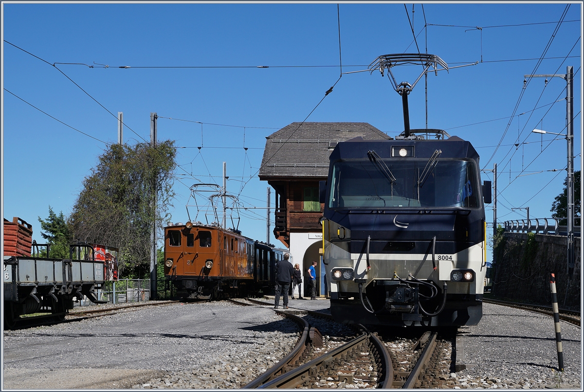 Zwei ziemlich unterschiedliche Ge 4/4 in Chamby: Links die Bernina Bahn Ge 4/4 181 der Blonay-Chamby Bahn und rechts die Ge 4/4 8004 der MOB. (Hinweis zum Fotostandort: das Bild entstand auf dem Strassen-Bahn Übergang bei geöffneten Schranken)

8. Juni 2019