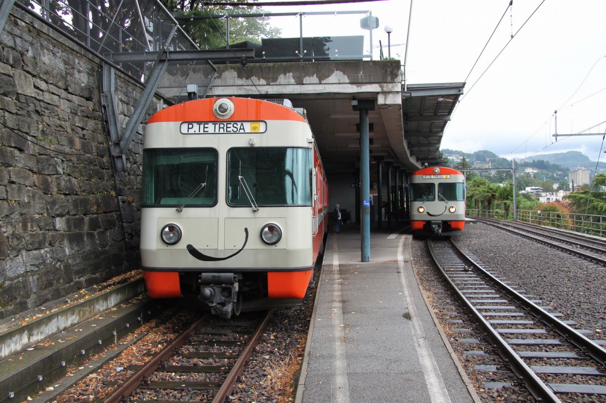 Zwei Züge der Ponte Tresa Bahn im FLP Bahnhof Lugano Bahnbilder.de