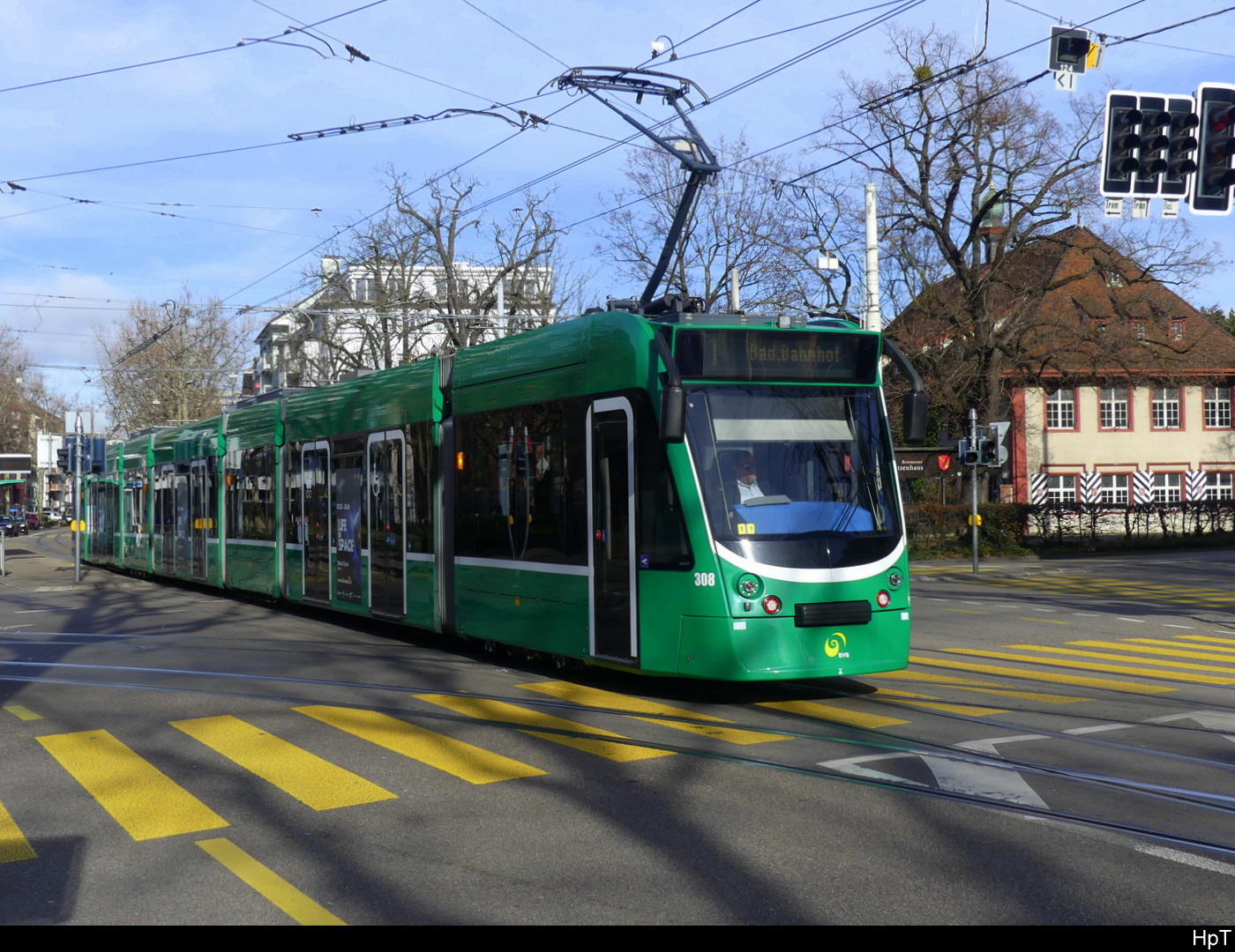 BVB - Tram Be 6/8  308 unterwegs auf der Linie 1 in der Stadt Basel am 04.02.2024