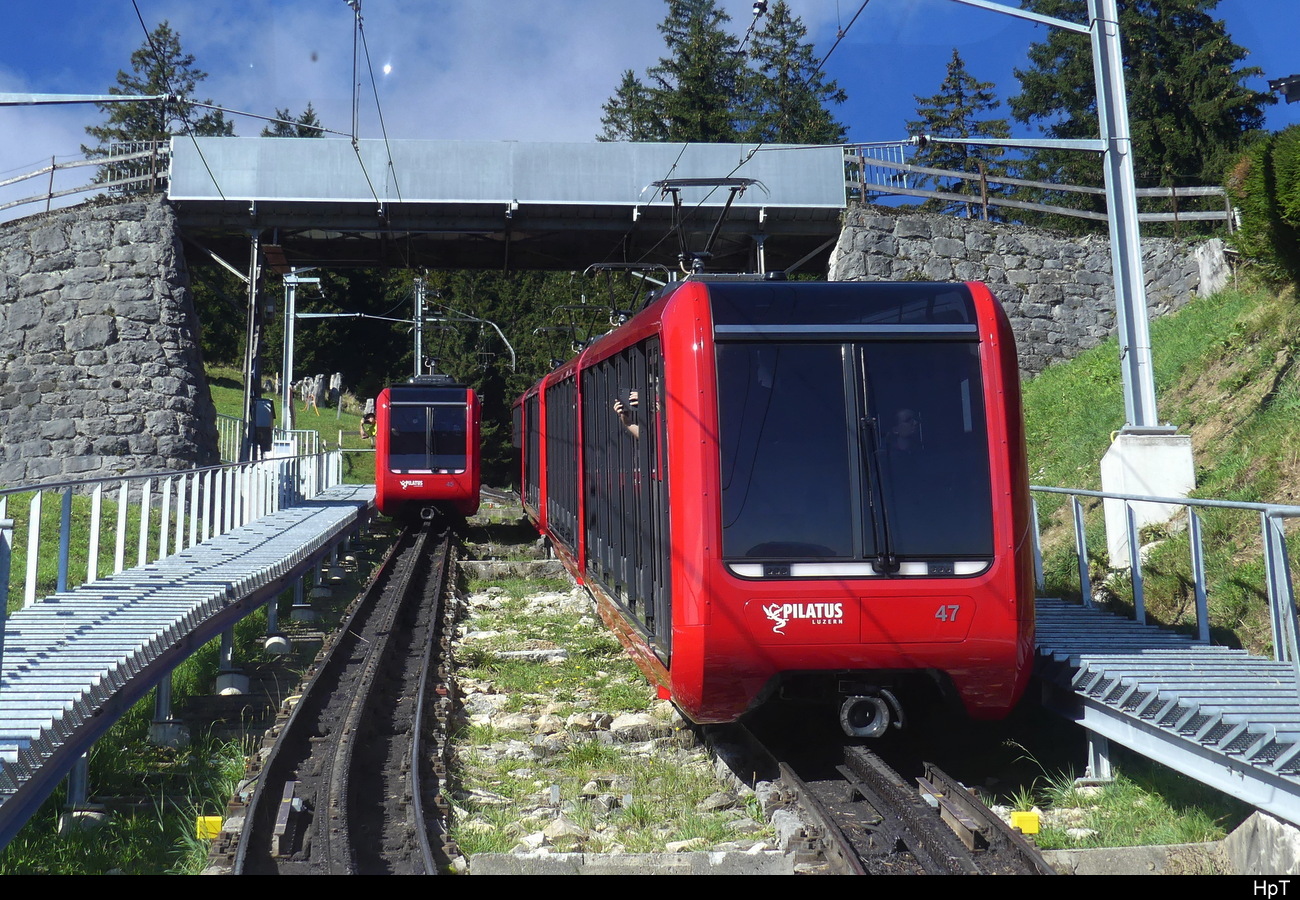 Pilatusbahn - Kreuzung in Ämsigen mit dem Bhe 2/2 47 und  weiteteren Triebwagen am 20.09.2023