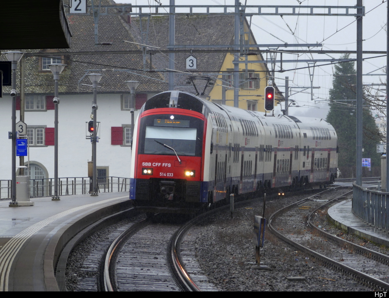 SBB - RABe 514 033-5 bei der einfahrt im Bhf. Horgen am 12.03.2023