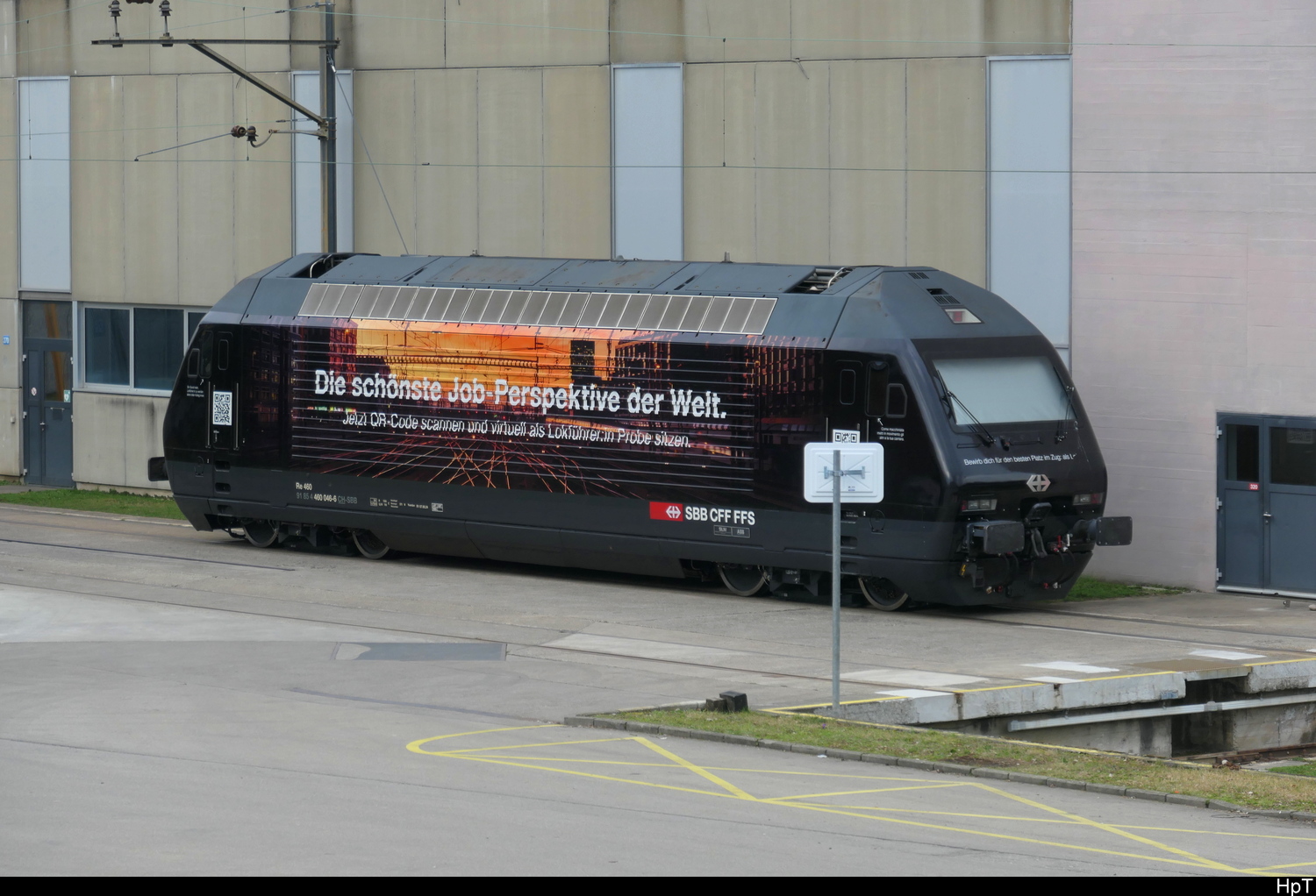 SBB - Werbelok 460 046-6 im Areal der HW in Zürich am 28.02.2026 .. Standort des Fotografen auf der Duttweiler Brücke