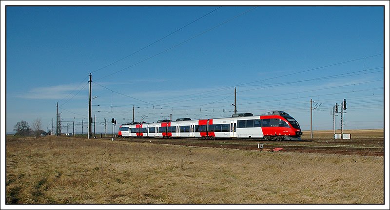  4024 014 als S 60 am 11.3.2007 von Wien kommend auf dem Weg nach Bruck a.d.Leitha bei der Einfahrt in Gramatneusiedl.