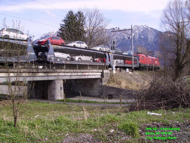 1016 041 - 4 macht sich mit einem  Peugeot-Autozug  in richtung Osten.
Buchs SG 15.03.08