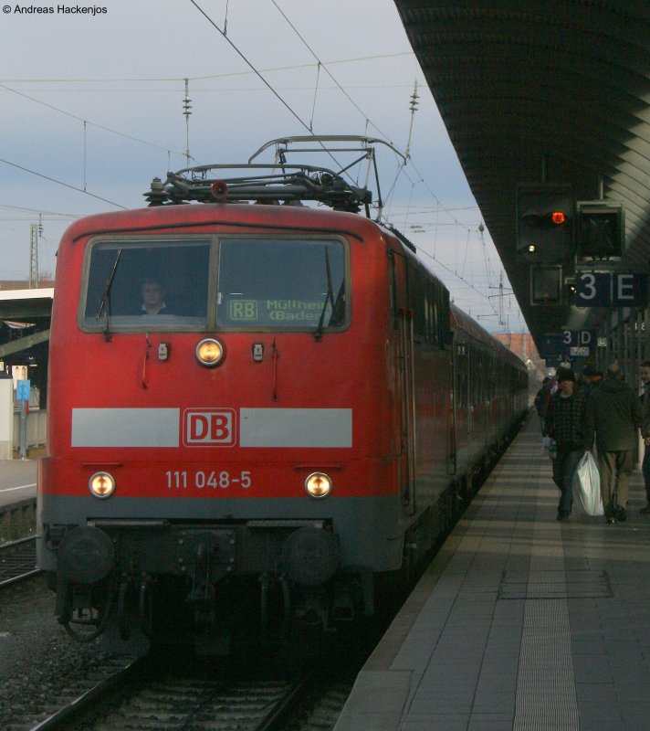 111 048-5 mit der  RB 31087 nach M�llheim(Baden) in Freiburg 22.12.08