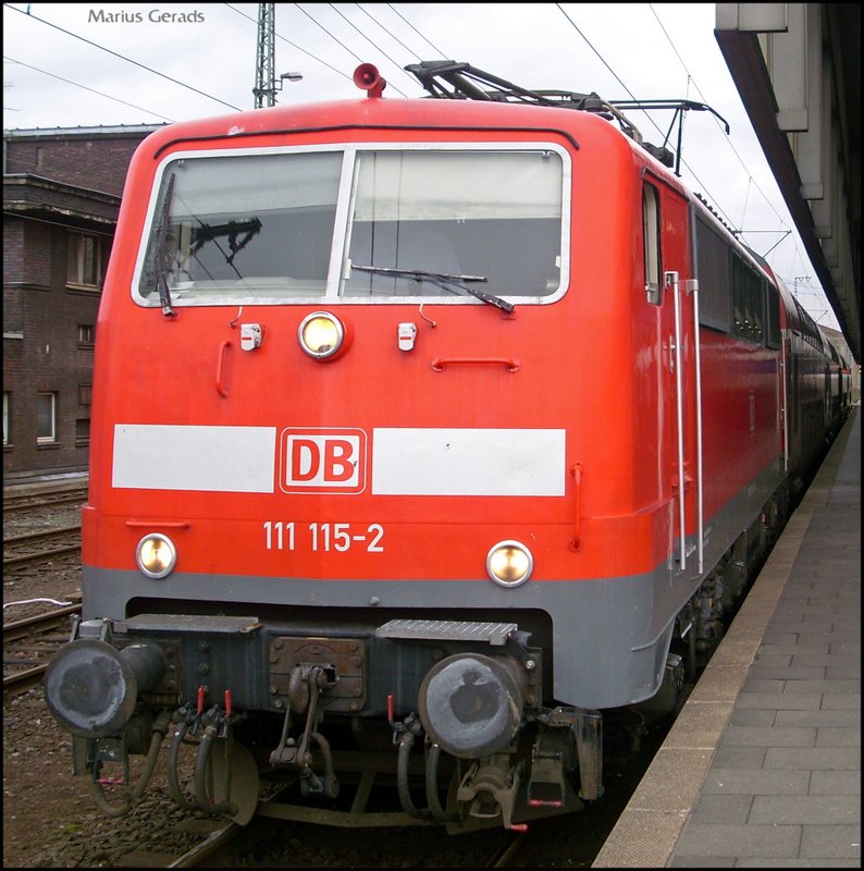 111 115-2 mit RE10418 in Dsseldorf Hbf 15.3.2009