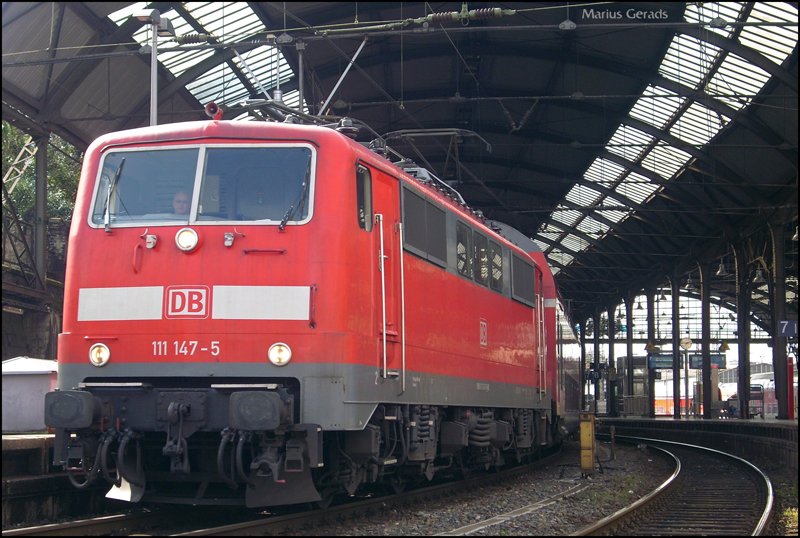 111 147 mit RE4871 bei der Ausfahrt von Aachen Hbf