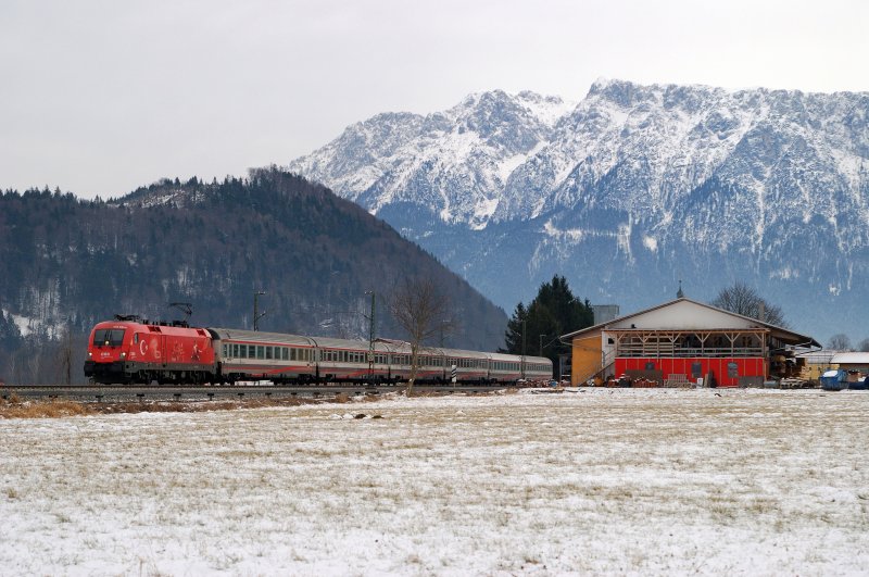 1116 031 (EM - T�rkei) mit EC 188 bei Oberaudorf (02.02.2009)