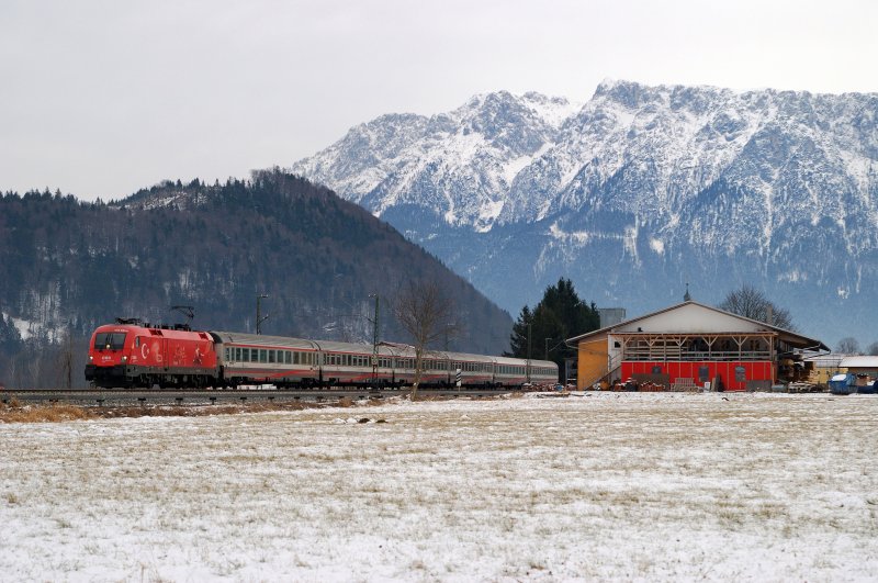 1116 031 (EM - Trkei) mit EC 188 bei Oberaudorf (02.02.2009)