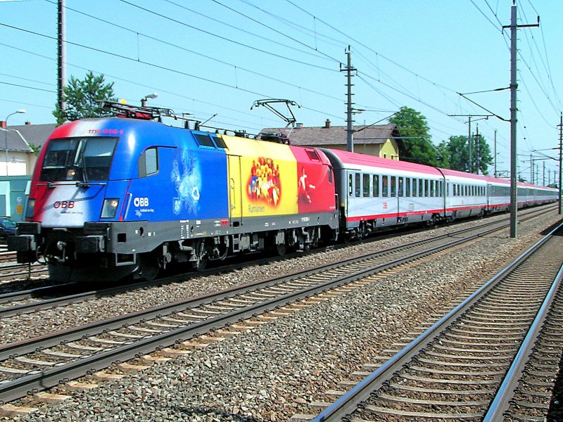 1116 056-1 RUMNIEN  durchfhrt mit OIC546(Spa-Hotel Almesberger) den Bhf. Marchtrenk; 090525