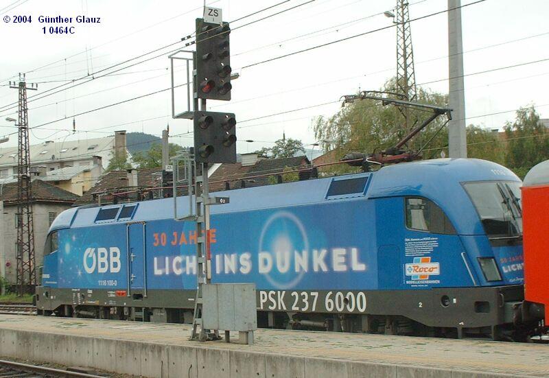 1116 100-7  Licht ins Dunkel  mit ROCO-Werbung am 31.08.2004 in Innsbruck Hbf.