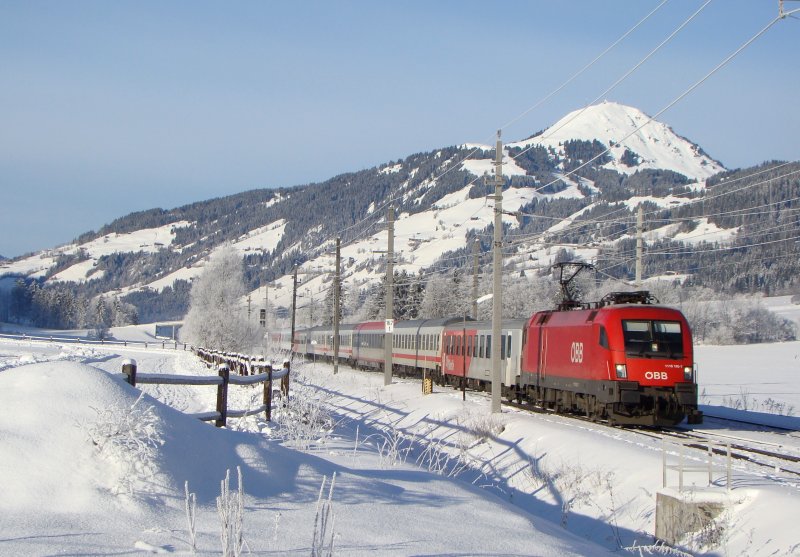1116 195-7 als IC 515 bei Kirchberg in Tirol.23.01.2009