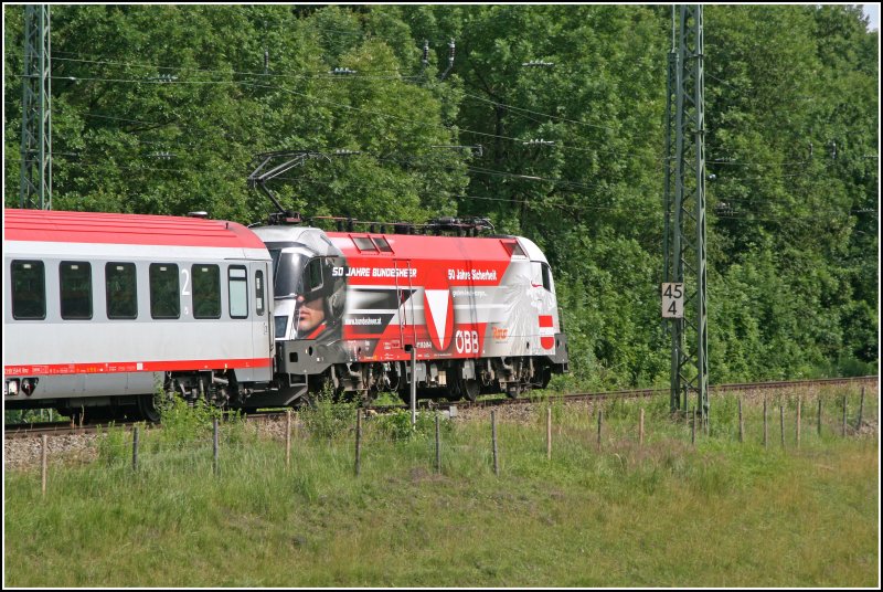 1116 246 fhrt bei Aling mit dem OEC 69  MOZART  von Mnchen nach Wien West am Haken Richtung Salzburg. (01.07.07)