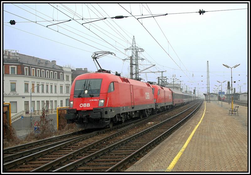 1116 256 an der Spitze des OEC 162 von Wien-West nach Basel am 25.2.06 bei der Durchfahrt in Htteldorf.