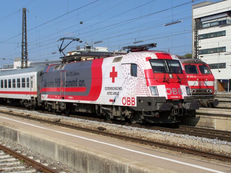 1116 264 mit Werbung fr das sterreichische Rote Kreuz steht mit IC 2083 abfahrtbereit in Augsburg Hbf. Aufnahme vom 07.10.2007
