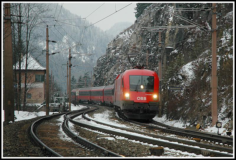 1116 269 mit dem IC 539 kurz vor der Durchfahrt in Breitenstein am 26.2.2006