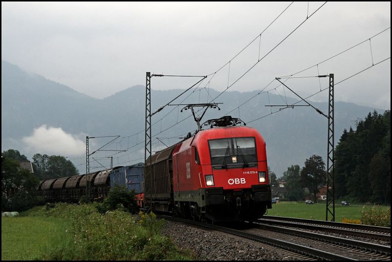 1116 272 legt sich am nassen 04.08.2009 bei Niederaudorf in die Kurve. 