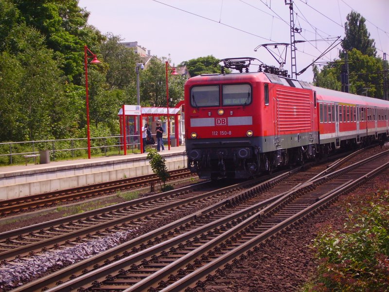 112 150-8 verlsst Elmshorn mit dem RE nach Kiel. 1.06.07